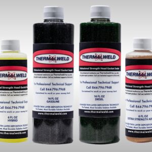 A group of four bottles of paint.